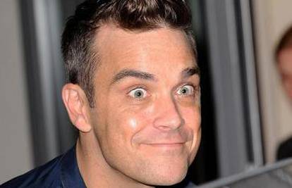 Robbie Williams odrezat će pramen kose za fanove