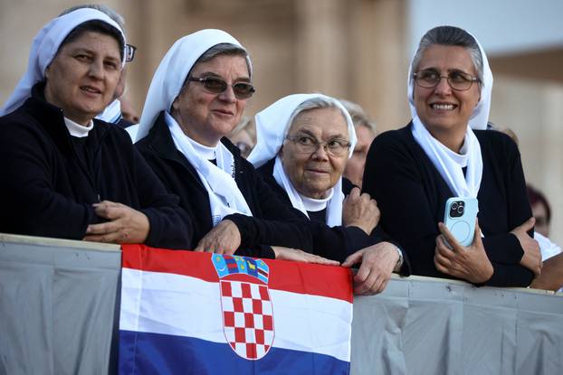 Pope Leo XIV greets the faithful ahead of a Holy Mass presided over by Metropolitan Archbishop of Zagreb Drazen Kutlesa, at the Vatican