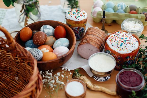 Easter preparations.  Easter modern eggs, easter bread, ham, bee