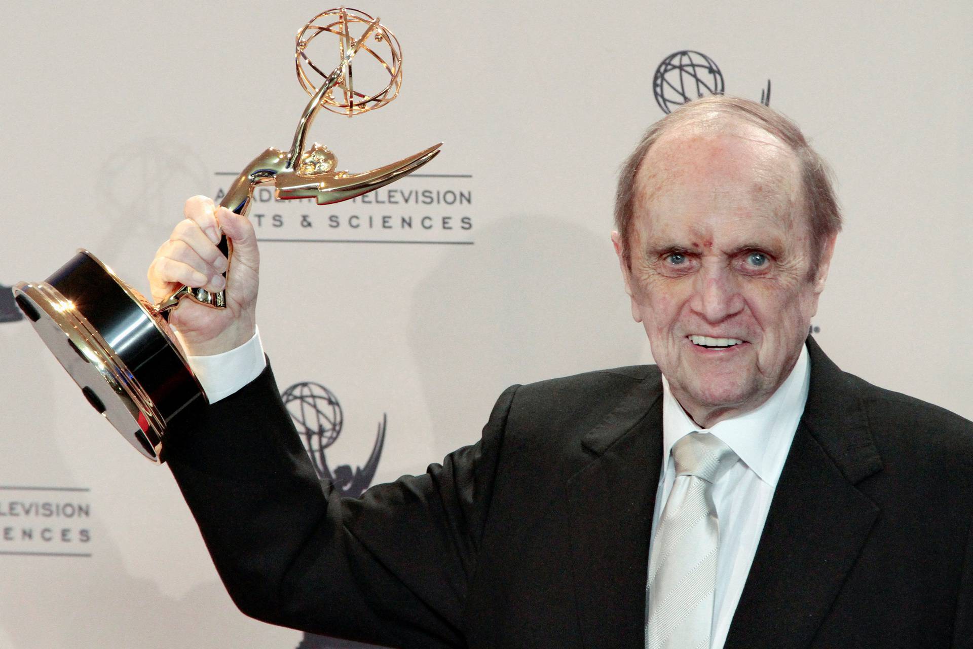 FILE PHOTO: Actor Newhart poses backstage with the Emmy for Outstanding Guest Actor at the 65th Primetime Creative Arts Emmy Awards in Los Angeles