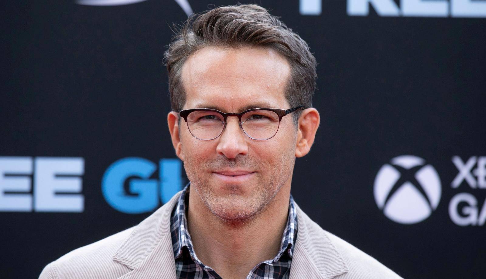 FILE PHOTO: Actor Ryan Reynolds poses at the premiere for the film "Free Guy" in New York