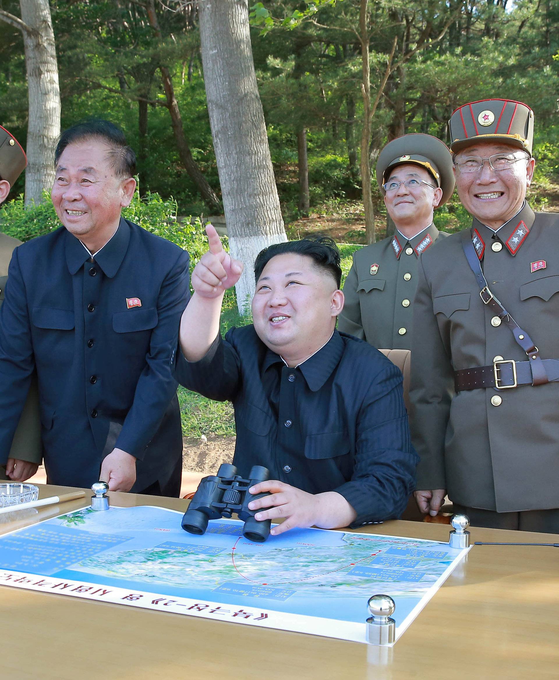 North Korean leader Kim Jong Un inspects the intermediate-range ballistic missile Pukguksong-2's launch test