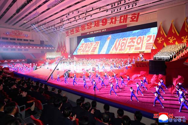 People watch a performance to commemorate the Ninth Congress of the ruling Workers' Party of Korea (WPK) in Pyongyang