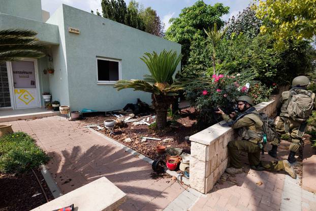 Israeli army secures kibbutz Kfar Aza after massacre of civilians by Hamas