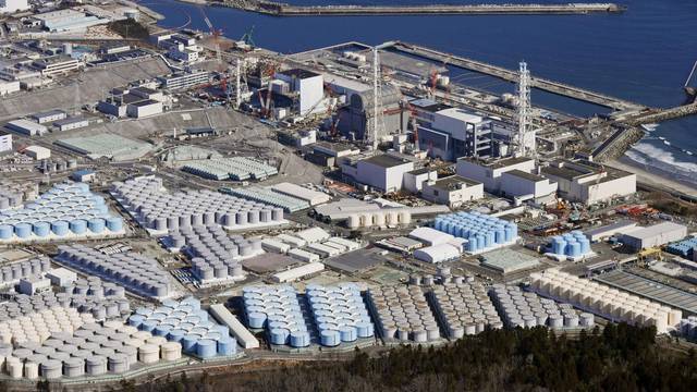 FILE PHOTO: An aerial view shows the storage tanks for treated water at the tsunami-crippled Fukushima Daiichi nuclear power plant in Okuma town, Fukushima prefecture