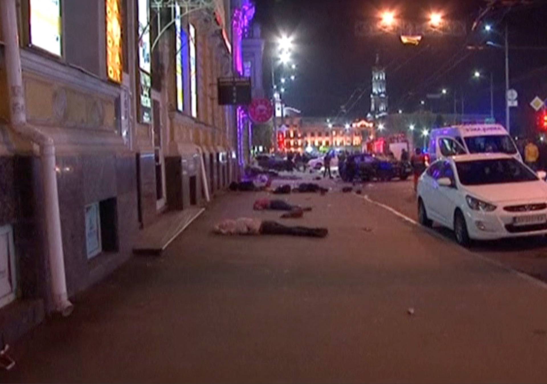 A still image taken from a video shot on October 18, 2017, shows police working at the accident scene after a car drove into pedestrians following a vehicle collision in central Kharkiv