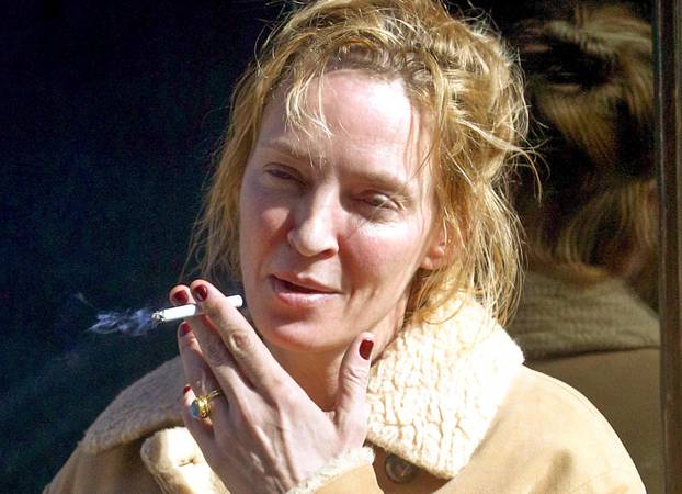 *EXCLUSIVE* Uma Thurman looks run down smoking cigarettes