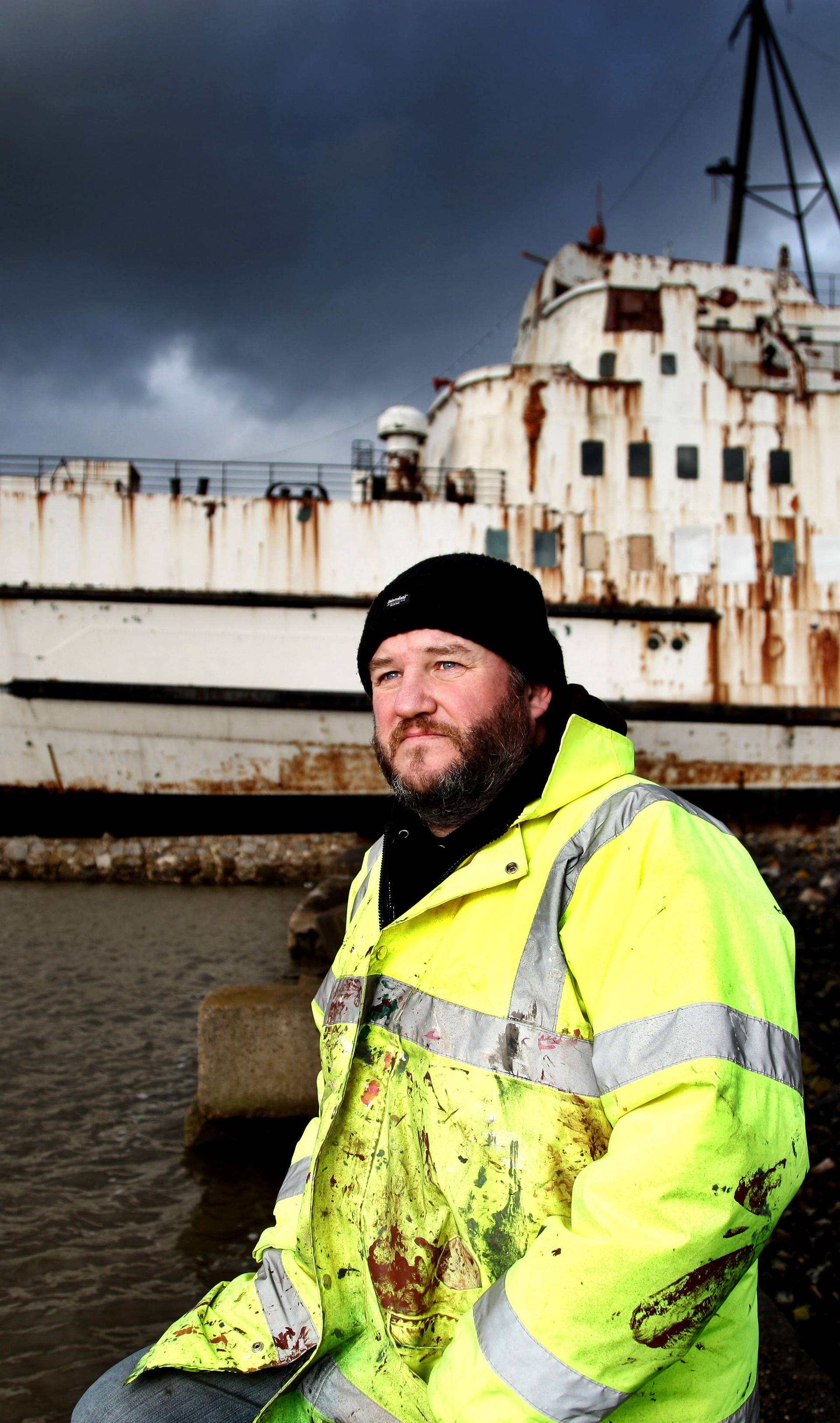 Paul Williams with the abandoned Duke of Lancaster ship, Mostyn Docks, North Wales