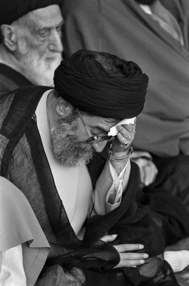 FILE PHOTO: Iran's Supreme Leader Ali Khamenei wipes his brow during a memorial service for the late Ayatollah Ruhollah Khomeini in Tehran, Iran