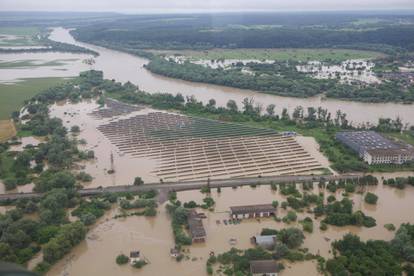 An aerial view shows flooded solar pawer plant outside of Ivano-Frankivsk