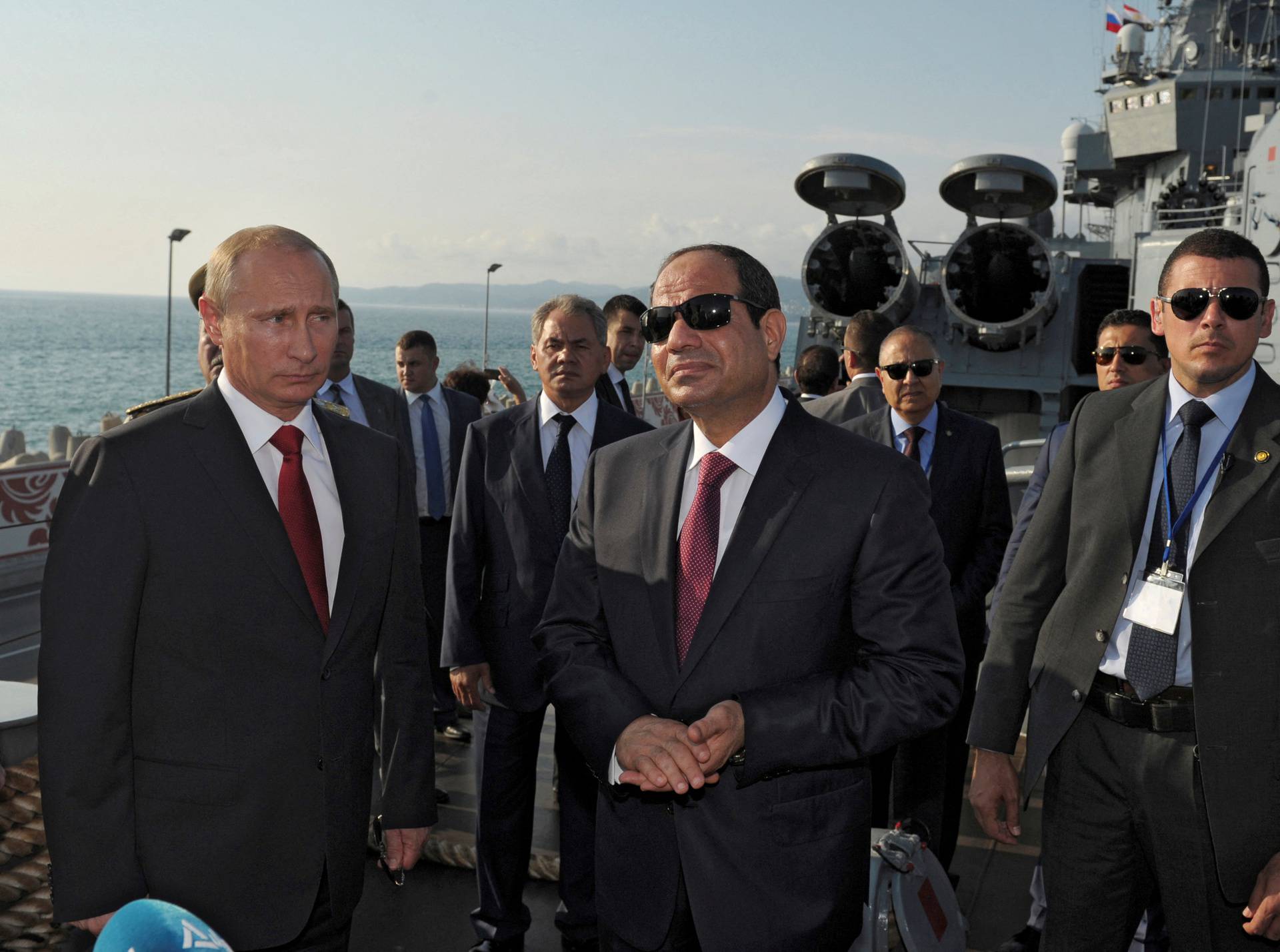 FILE PHOTO: Russia's President Putin and his Egyptian counterpart Sisi stand on the deck of guided missile cruiser Moskva in Sochi