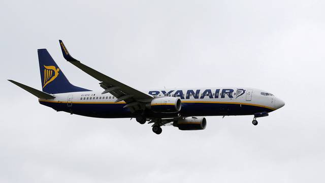 A Ryanair aircraft lands at Manchester Airport in Manchester