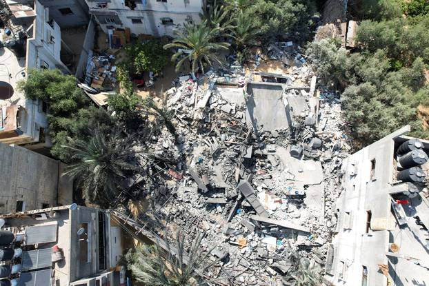 A view of a Palestinian house destroyed by Israeli airstrikes during recent fighting between Israel-Gaza, in Beit Lahiya in the northern Gaza Strip