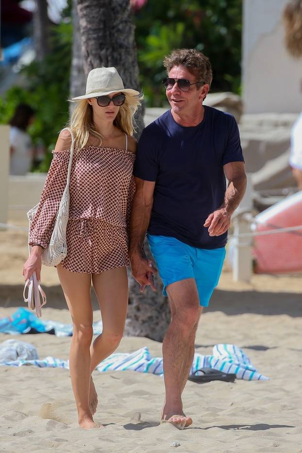 *EXCLUSIVE* A shirtless Dennis Quaid 65, shows off his ripped body while enjoying a beach day with 26 year old girlfriend, Laura Savoie in Hawaii! - ** WEB MUST CALL FOR PRICING **