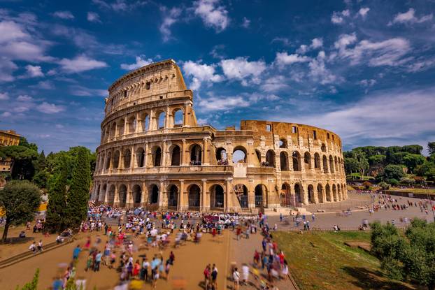Tourists Visiting The Colosseum in Rome Italy