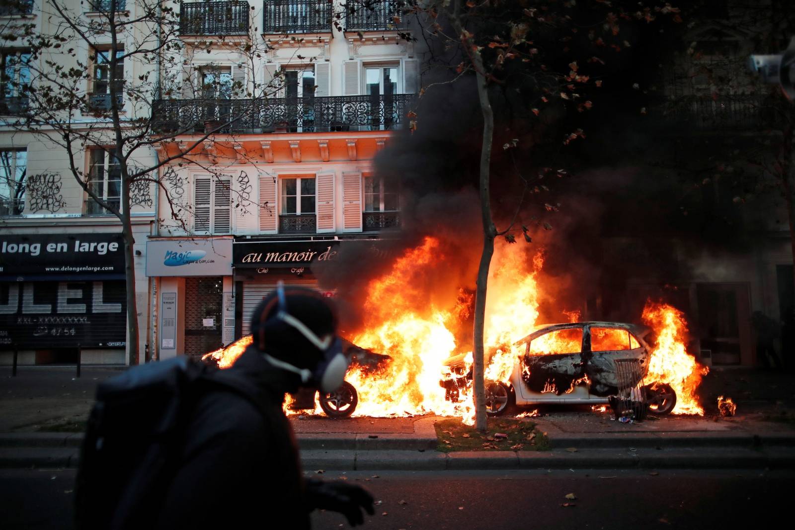 Protests over proposed curbs on identifying police, in Paris