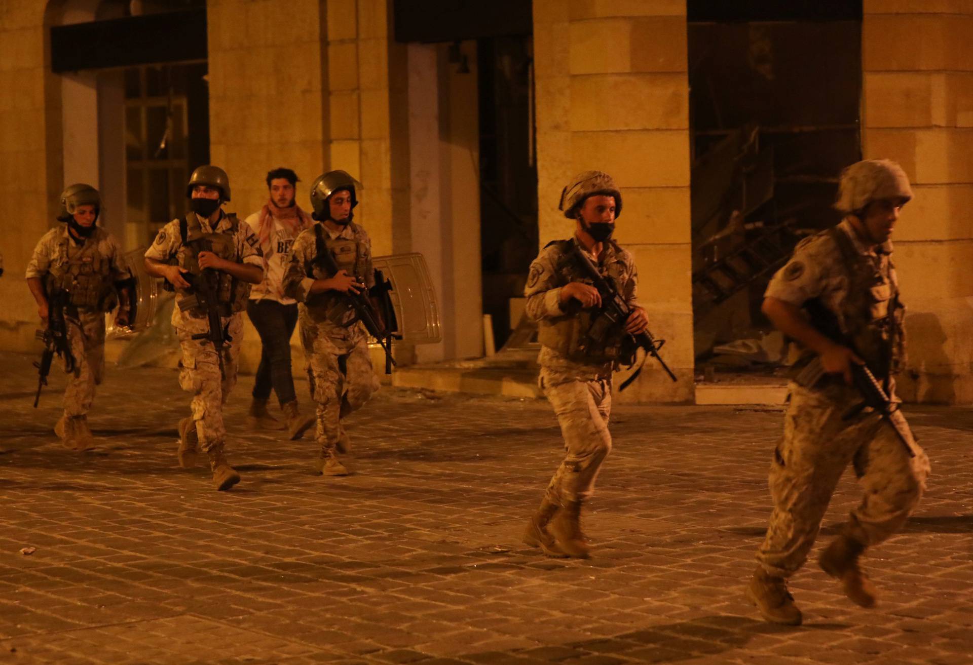Army soldiers are deployed during a protest near parliament in Beirut