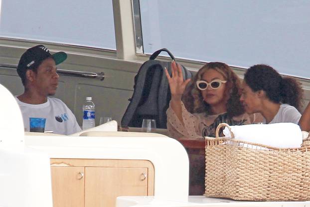 Glamor couple Jay Z and Beyonce treat friends and family to a power boat ride around Miami