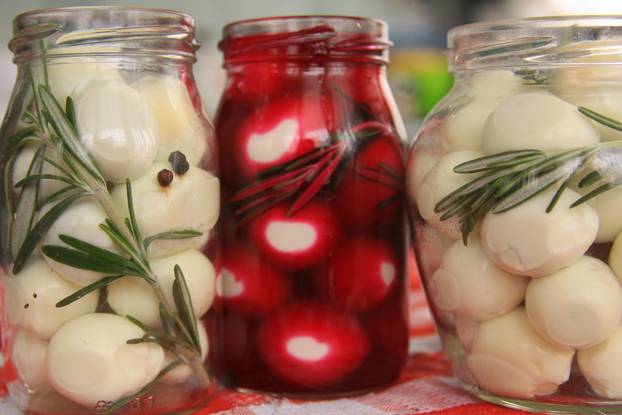 Marinated quail eggs in jars