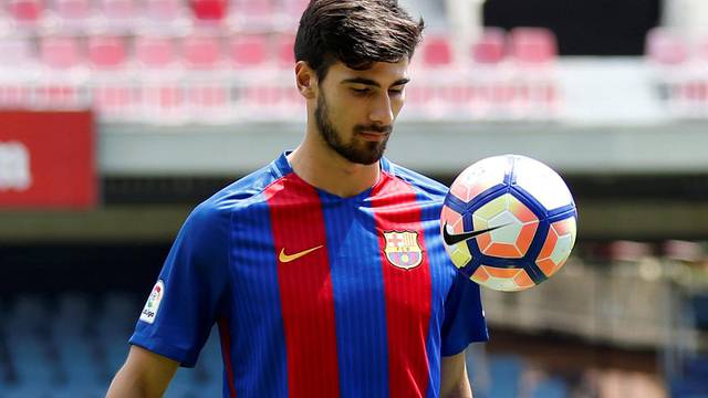 FC Barcelona's newly signed soccer player Andre Gomes plays with a ball during his presentation at Miniestadi stadium in Barcelona