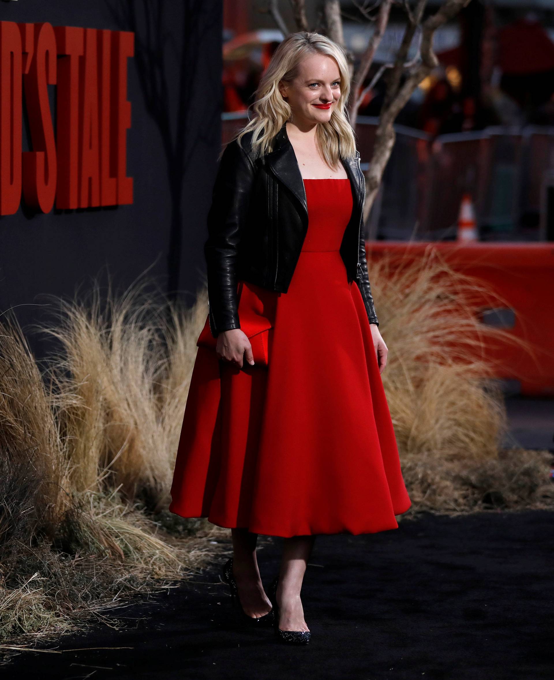 Cast member Moss poses at the premiere for the second season of the television series "The Handmaid's Tale" in Los Angeles