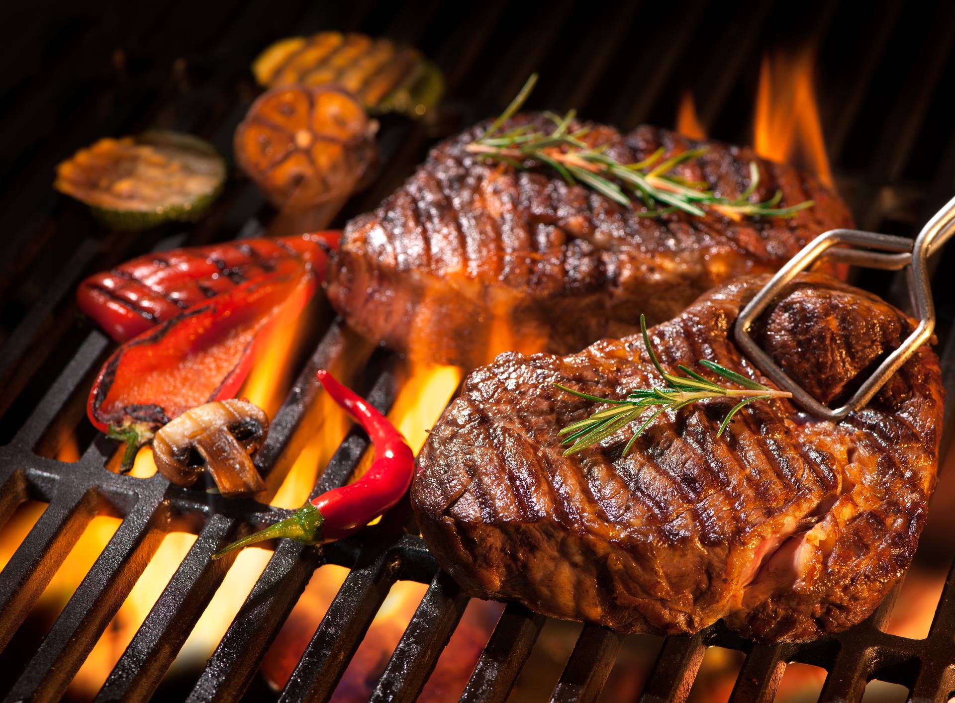 Beef steaks on the grill