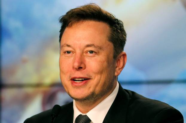 FILE PHOTO: SpaceX founder and chief engineer Elon Musk speaks at a post-launch news conference to discuss the  SpaceX Crew Dragon astronaut capsule in-flight abort test at the Kennedy Space Center