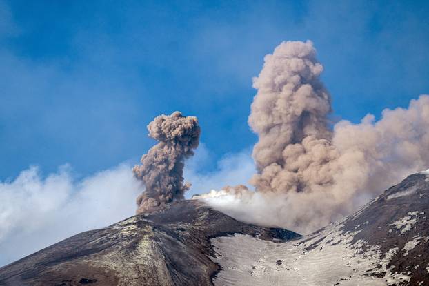 Italy's Mount Etna erupts