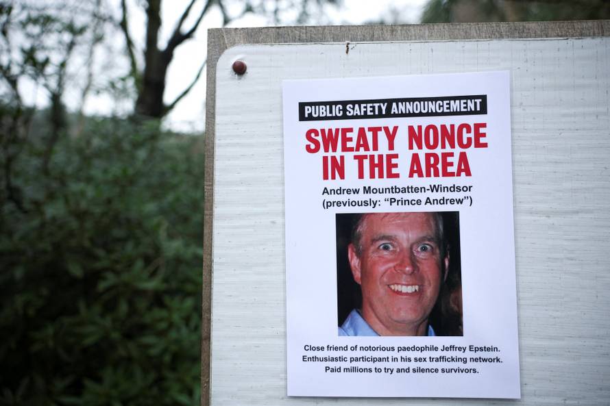 A poster by campaign group 'Everyone Hates Elon' featuring Andrew Mountbatten-Windsor, formerly known as Prince Andrew, is displayed near Sandringham Estate in Wolferton