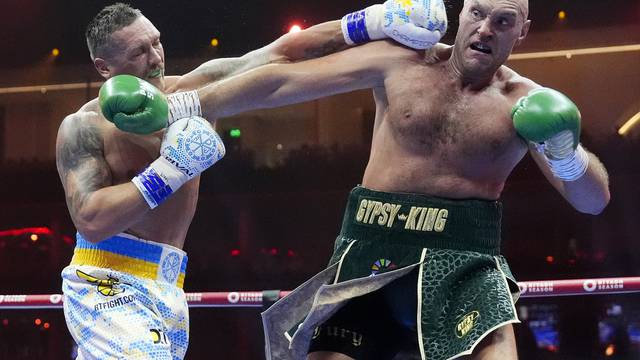 Tyson Fury and Oleksandr Usyk file photo