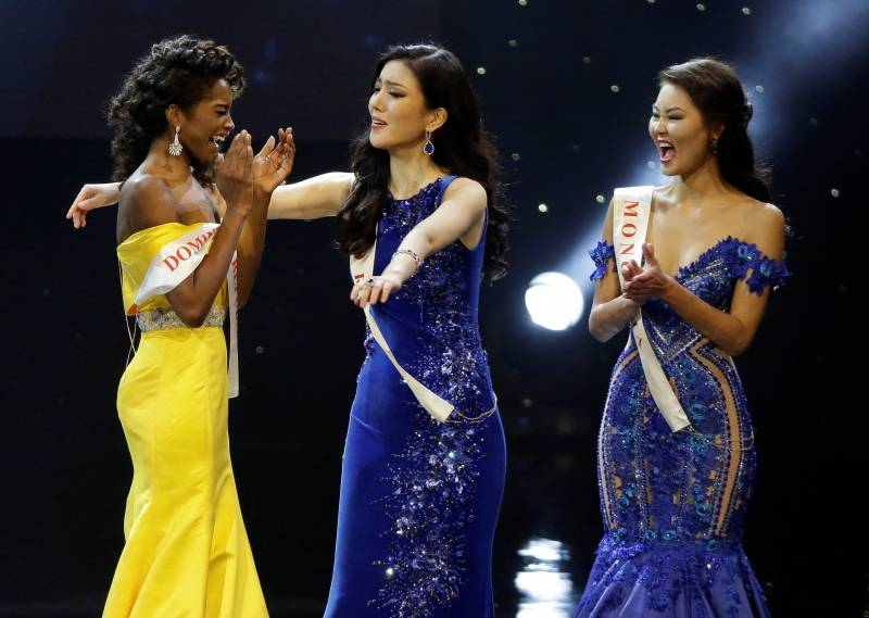 Miss Dominican Republic Yaritza Miguelina Reyes Ramirez is congratulated by Miss Korea Hyun Wang and Miss Mongolia Bayartsetseg Altangerel after she was named a finalist in the Miss World 2016 Competition in Oxen Hill.