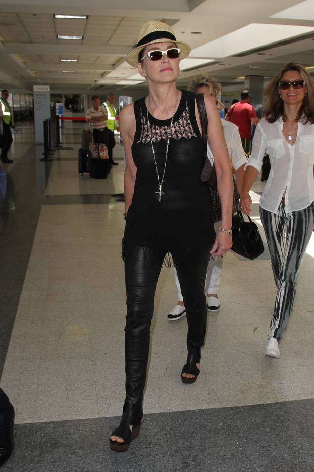 Sharon Stone lets it fly before her flight