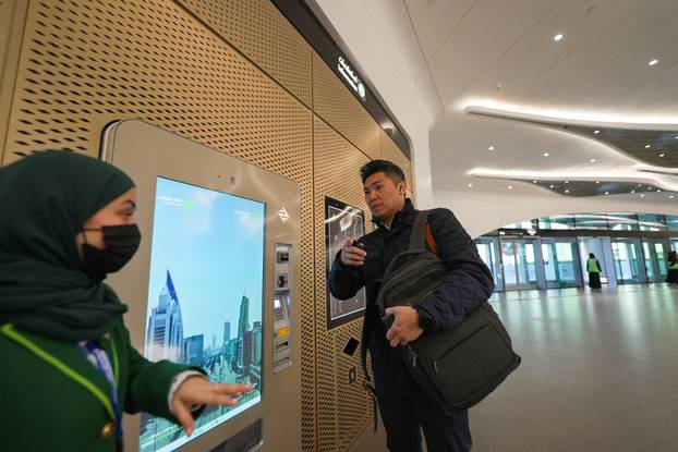 Passengers arrive at the King Abdullah Financial District Metro Station in Riyadh