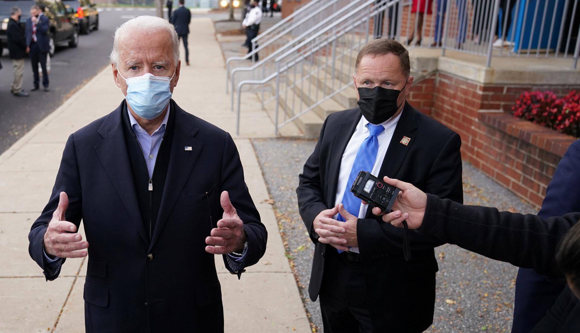 U.S. Democratic presidential nominee Joe Biden talks to reporters on Election Day in Wilmington