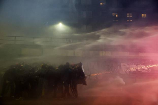 Demonstrators protest the 2026 Winter Olympics in Milan