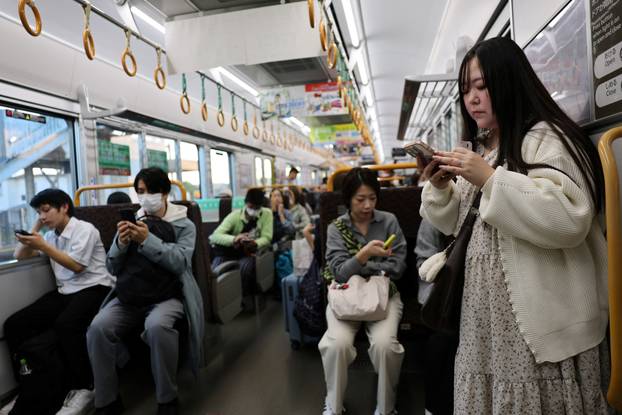 The Wider Image: AI romance blooms as Japanese woman weds virtual partner of her dreams