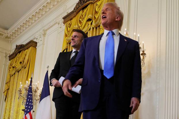 U.S. President Donald Trump and French President Emmanuel Macron attend a press conference at the White House in Washington