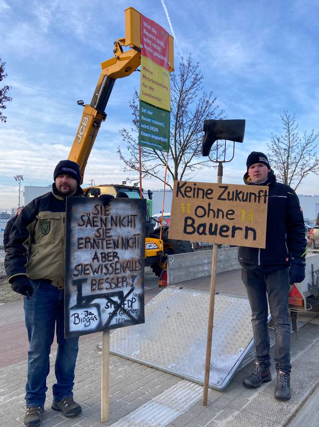 German farmers take part in a protest against the cut of farm vehicle tax subsidies of the so-called German Ampel Coalition government, in Cottbus