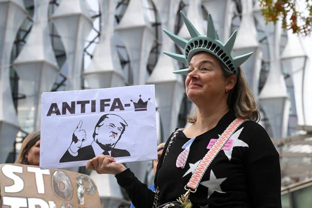 Demonstrators gather during a 'No Kings' protest against U.S.President Donald Trump's policies in London