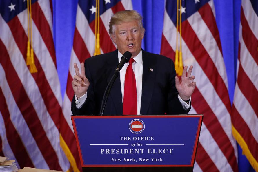 U.S. President-elect Donald Trump speaks during a news conference in the lobby of Trump Tower in Manhattan, New York City