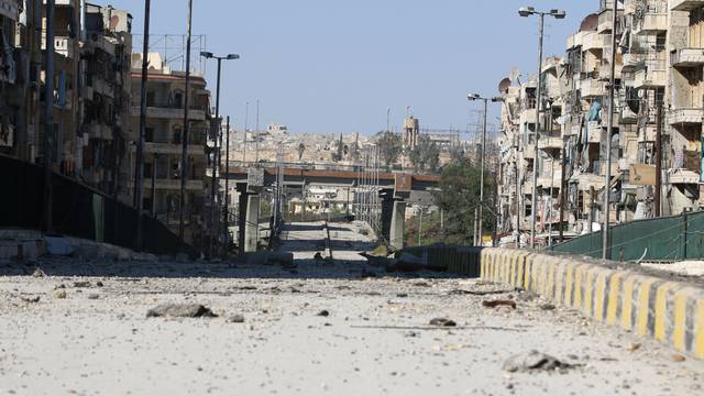 A damaged highway is pictured in the rebel-held al-Shaar neighbourhood of Aleppo