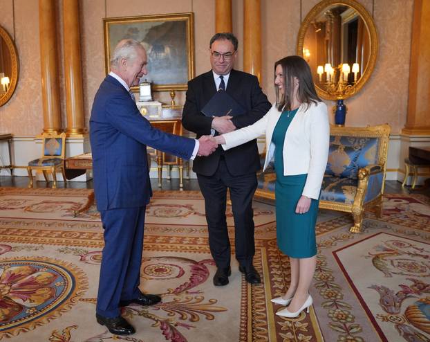 King Charles is presented with the first bank notes featuring his portrait in London