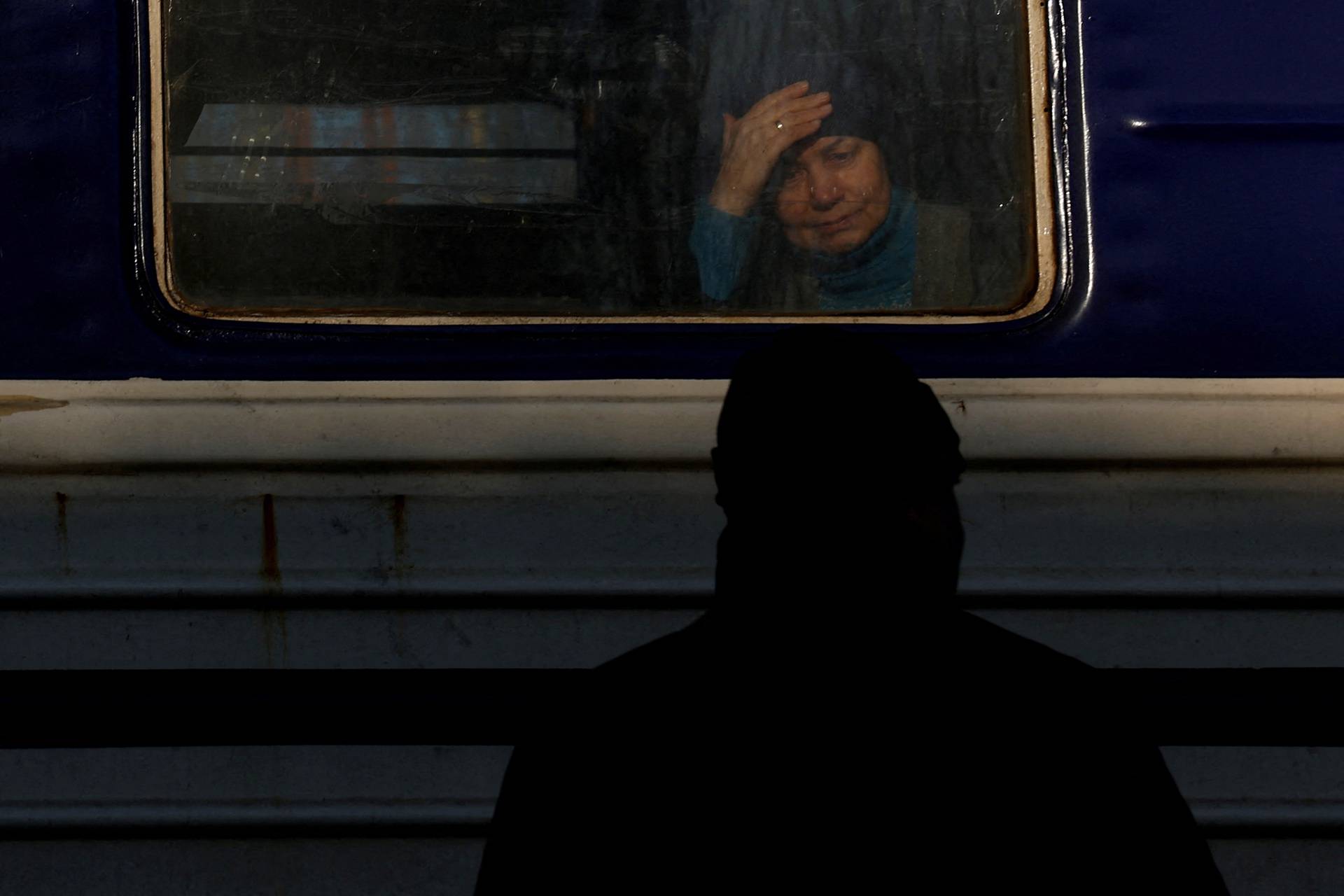 People board an evacuation train to Lviv, in Pokrovsk