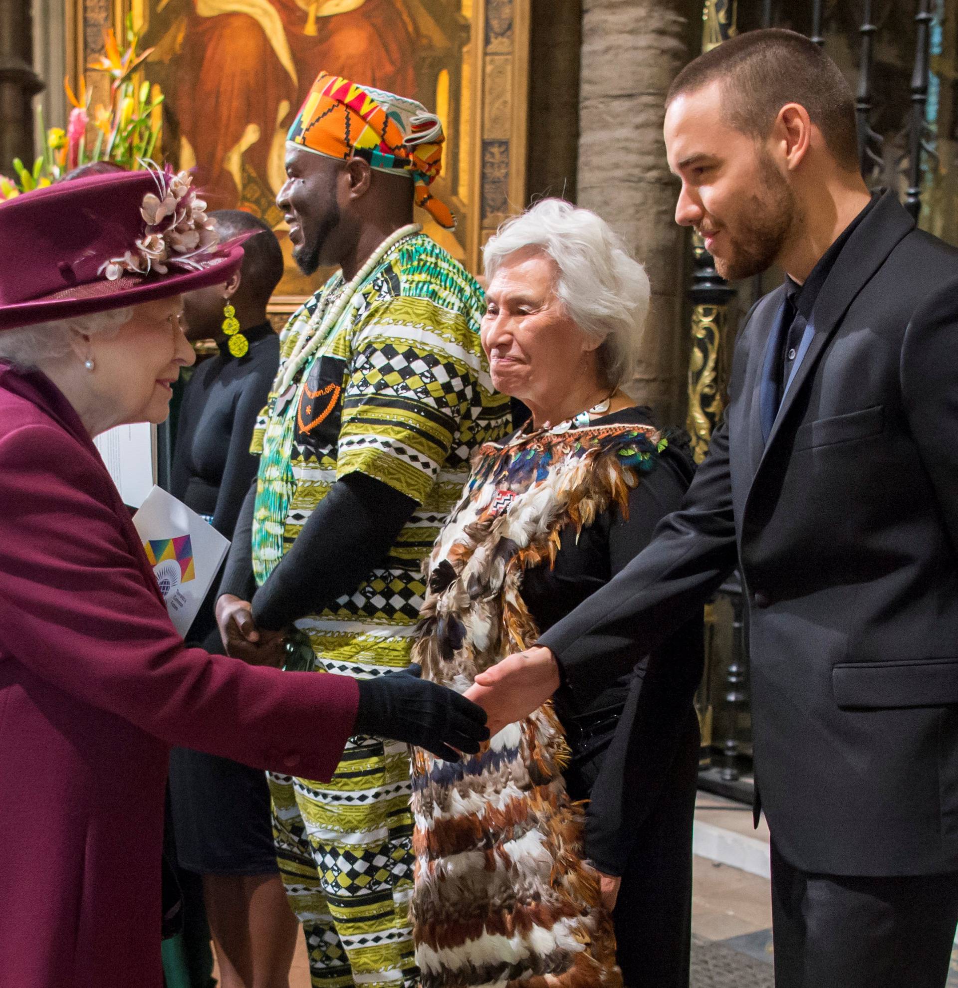 Britain's Queen Elizabeth meets Liam Payne after the Commonwealth Service at Westminster Abbey in London