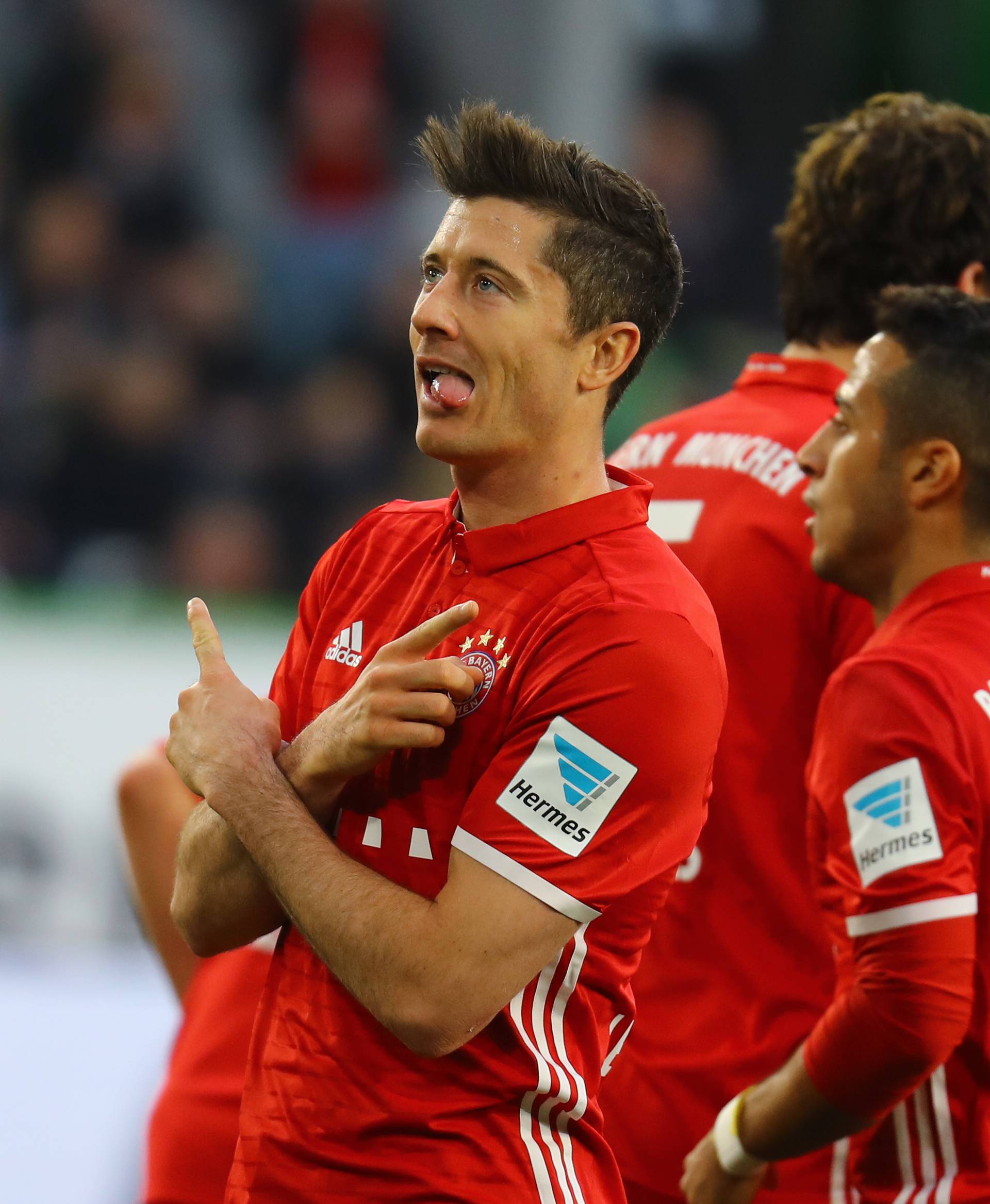 Bayern Munich's Robert Lewandowski celebrates scoring their third goal