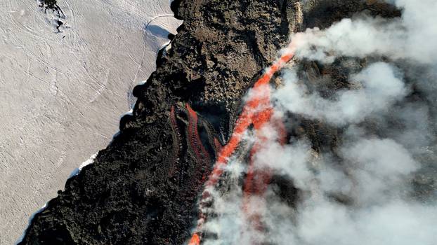 Italy's Mount Etna erupts