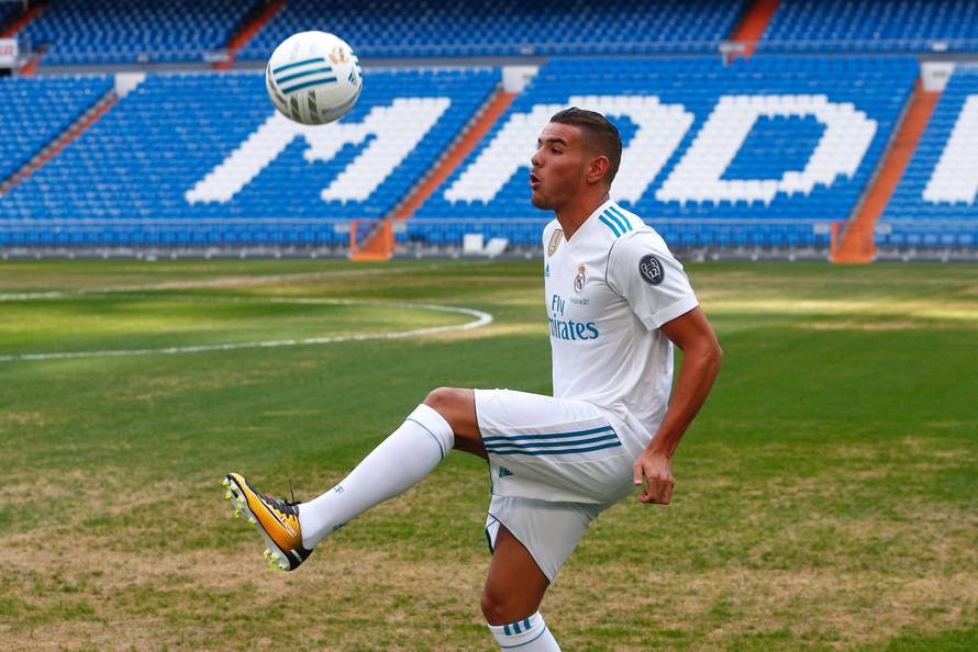 Real Madrid's new player Theo Hernandez controls the ball during his presentation at the Santiago Bernabeu Stadium in Madrid