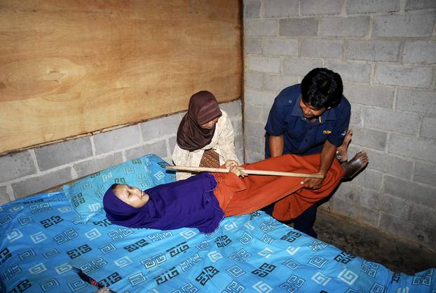 Sulami, An Indonesian Woman Suffering From Spine Bamboo