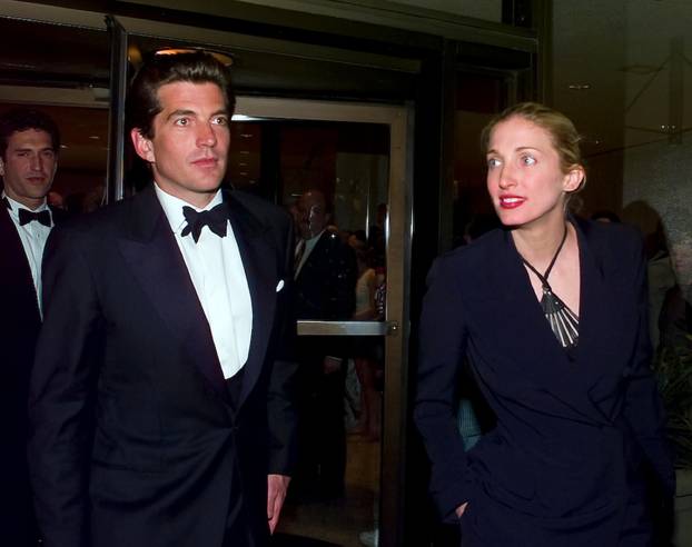 John F. Kennedy, Jr. and his wife, Carolyn Bessette Kennedy depart the Washington Hilton after the White House Correspondent's Dinner in Washington, D.C. on May 1, 1999..Credit: Ron Sachs / CNP /MediaPunch