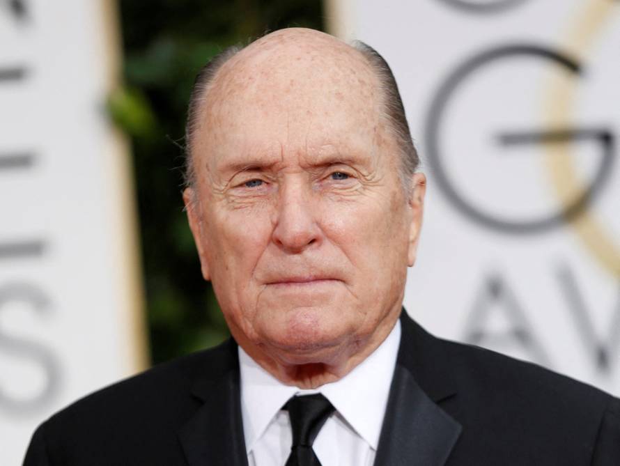 FILE PHOTO: Actor Robert Duvall arrives at the 72nd Golden Globe Awards in Beverly Hills, California